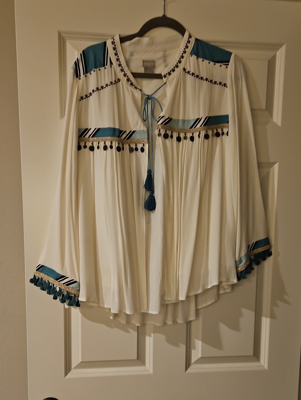Women's Cream Boho Tassel Blouse with Teal Accents
